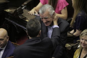 BUENOS AIRES, ARGENTINA- In the photos taken today December 4, 2019, the deputy José Luis Gioja (front) greets Sergio Massa (back). The Chamber of Deputies formalized its new conformation with the oath of the 130 new deputies who will debut from December 10 with the discussion of the first Budget of the elected president, Alberto Fernández. Just after 1 pm and conducted by Deputy Gonzalo Del Cerro, the preparatory session began in which the legislators who were elected last October took an oath and will also vote for the new lower house authorities.