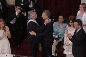 BUENOS AIRES, ARGENTINA.- In the photo the moment when the outgoing president Mauricio Macri (right) gives the baton and the presidential band to the new president of Argentina Alberto Fernández. In the photo taken on December 10, 2019, Alberto Fernández assumed today, December 10, the Presidency of Argentina by swearing in Congress with Vice President Cristina Fernández de Kirchner and receiving the command attributes from the hands of his predecessor, Mauricio Macri. After the assumption, Fernández delivered - before the Legislative Assembly - a speech of conciliatory tone, but in which he drew a hard diagnosis of the situation that the country is going through and proposed a clear change of course.