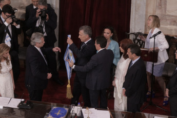 BUENOS AIRES, ARGENTINA.- In the photo the moment when the outgoing president Mauricio Macri (right) gives the baton and the presidential band to the new president of Argentina Alberto Fernández.In the photo taken on December 10, 2019, Alberto Fernández assumed today, December 10, the Presidency of Argentina by swearing in Congress with Vice President Cristina Fernández de Kirchner and receiving the command attributes from the hands of his predecessor, Mauricio Macri. After the assumption, Fernández delivered - before the Legislative Assembly - a speech of conciliatory tone, but in which he drew a hard diagnosis of the situation that the country is going through and proposed a clear change of course.