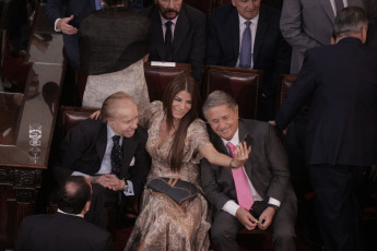 BUENOS AIRES, ARGENTINA.-In the photo, from left to right, former President Carlos Menem, his daughter Zulema, and former President and governor of the Province of Buenos Aires, Eduardo Duhalde. In the photo taken on December 10, 2019, Alberto Fernández assumed today, December 10, the Presidency of Argentina by swearing in Congress with Vice President Cristina Fernández de Kirchner and receiving the command attributes from the hands of his predecessor, Mauricio Macri. After the assumption, Fernández delivered - before the Legislative Assembly - a speech of conciliatory tone, but in which he drew a hard diagnosis of the situation that the country is going through and proposed a clear change of course.