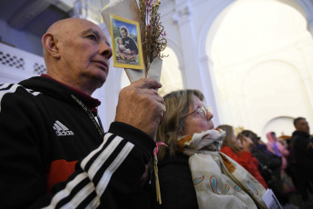 Buenos Aires, Argentina.- In the photos taken on August 7, 2023, the faithful of San Cayetano hold a vigil in the Church on Cuzco Street 150, in the Liniers neighborhood of Buenos Aires, which opens its doors for people to ask for "peace, bread, health and work" in a new commemoration of the patron. The Central Mass will take place this Monday and will be presided over by the Archbishop of Buenos Aires, García Cuerva.