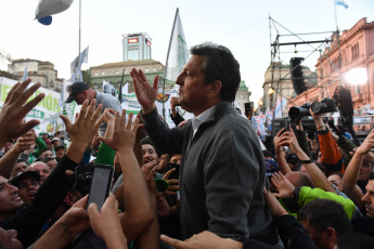 Buenos Aires, Argentina.- In the photos taken on September 11, 2023, the Minister of Economy, Sergio Massa (center), announced in Plaza de Mayo before a crowd of workers that starting next October 1 the new floor of the Tax on Profits will rise to 1,770,000 pesos per month, which will reduce their impact on salaries and pensions, all with semiannual adjustments.