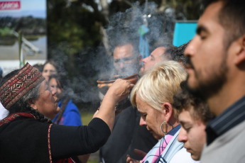 Buenos Aires, Argentina.- In the photos taken on August 31, 2023, members of indigenous peoples celebrate Pachamama on Martin Garcia Island. With offerings, sahumos and sounds of sacred shells, native peoples celebrated Pachamama in this place considered an "environmental jewel" in the middle of the Río de la Plata, with an ancestral ceremony where a mouth was opened in the earth to treat it with food.