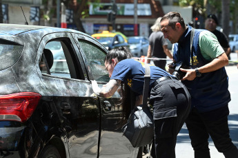 Rosario, Argentina.- In the photos taken on November 22, 2023, police and authorities carry out an inspection of the place where a car belonging to Antonela Roccuzzo's family was shot and eight million pesos were stolen in Rosario, Argentina. A group of criminals attacked the family of Antonela Roccuzzo, wife of the captain of the Argentine national team, Lionel Messi, to steal 8 billion pesos (USD22,443) from them. This is Roccuzzo's cousin, Agustina Scaglia, who was intercepted while they were traveling in a car.