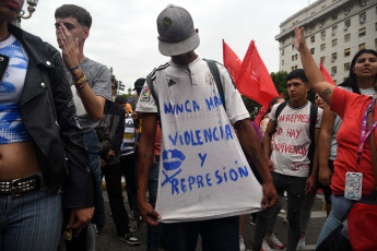 Buenos Aires, Argentina.- In the photos taken on December 5, 2023, thousands of protesters grouped in different political and social organizations participated in the 7th "cap march" under the slogan "Never again violence or repression" in the City from Buenos Aires. The annual meeting denounces police abuse and repression against young people from popular sectors.