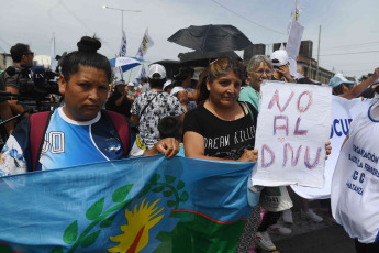 Buenos Aires, Argentina.- In the photos taken on December 28, 2023, a group of social organizations carry out a protest with a partial cut of Route 3, in the Buenos Aires district of La Matanza, in rejection of the decree of necessity and urgency (DNU) 70/2023 on deregulation of the economy.