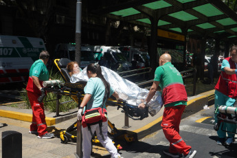 Buenos Aires, Argentina.- In the photos taken on December 12, 2023, firefighters fight the flames of a fire that broke out on two floors of a building adjacent to the headquarters of the Ministry of Labor, Employment and Social Security, in Buenos Aires. A woman died and more than eighty people had to be evacuated and treated by SAME due to the fierce fire. The first data from the investigation showed that the building did not have a gas connection, so the start of the fire could have been due to an electrical fault.