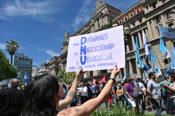 Buenos Aires, Argentina.- In the photos taken on December 27, 2023, the CGT, the two CTA, the Piquetera Unit, the Union of Workers of the Popular Economy (UTEP), the Classist and Combative Current, and parties of the left, among other social, political and union organizations, gathered in front of the Court Palace, in downtown Buenos Aires, to reject the decree of necessity and urgency (DNU) 70/2023 that deregulates the economy and repeals multiple laws, some of them labor, and accompany a judicial presentation that will be made against that measure.