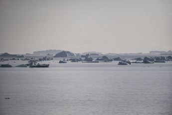 Antarctica- In the photo of January 13, 2024, the icebreaker ARA "Almirante Irízar", after having carried out logistical tasks in the Joint Orcadas Antarctic Base, continued its course and arrived at Caleta Potter, where it anchored opposite the Carlini Antarctic Scientific Base. Once there, through personnel transport vessels and vehicles, began with the discharge of Antarctic diesel (GOA), dry, fresh and refrigerated supplies; propane gas pipes and 2 diesel generator engines.