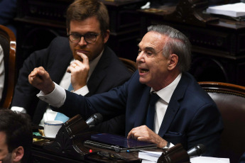 Buenos Aires, Argentina.- In the photos taken on January 31, 2024, Miguel Ángel Pichetto (r), head of the bloc of Hacemos Coalión Federal and Nicolás Massot (l), in the Deputies' chamber. The Chamber of Deputies debates the Omnibus Law project sent by Javier Milei, after the negotiations between the ruling party and the opposition that secured the floor of 129 deputies to enable the session.