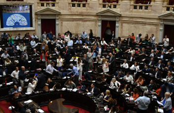 Buenos Aires, Argentina.- In the photos taken on February 6, 2024, Deputies validate the article that establishes the economic emergency. The reforms of the president of Argentina, Javier Milei, were reversed, due to lack of support from his allies in the Chamber of Deputies, which he will deal with again from scratch in a commission. The so-called Omnibus Law, which had been voted in general on February 2, 2024, was in full voting article by article when the official deputy Oscar Zago asked to return the project to the commission, for having voted on things different from those that had been negotiated previously.