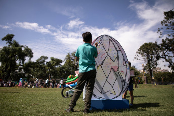 Buenos Aires, Argentina - In this photo taken on 29 March 2024, children play and pose in front of a giant inflatable bunny during an event to celebrate Easter in the Intendente Seeber square in the city of Buenos Aires, capital of Argentina.