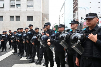 Buenos Aires, Argentina.- In the photos taken on April 15, 2024, under strong police custody around 300 workers from the former National Secretariat for Children, Adolescents and Family (SENAF) marched to the Ministry of Human Capital, in the center Buenos Aires, in repudiation of the layoffs that have occurred in the area since last January, almost fifty of them last Friday.