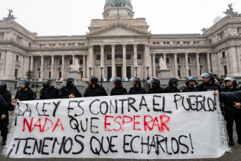 Buenos Aires, Argentina - In a photo of 12 June 2024, the area around the National Congress became a battlefield where demonstrators and security forces clashed throughout the afternoon of Wednesday 12 June. Social, piqueteras, leftist, Peronist, human rights, neighbourhood assemblies and trade union organisations demonstrated in rejection of the Ley Bases that is being debated in the Senate. The aim of the attack was to interrupt the session.